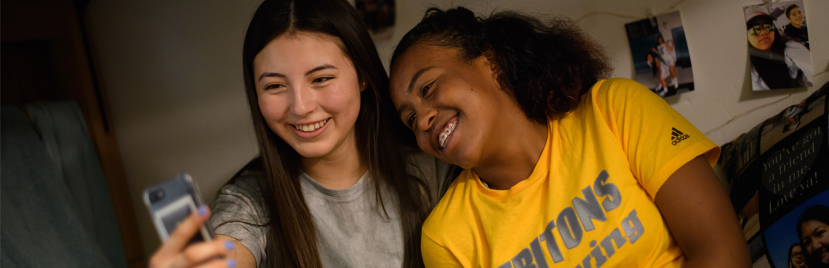 Student roommates taking a selfie